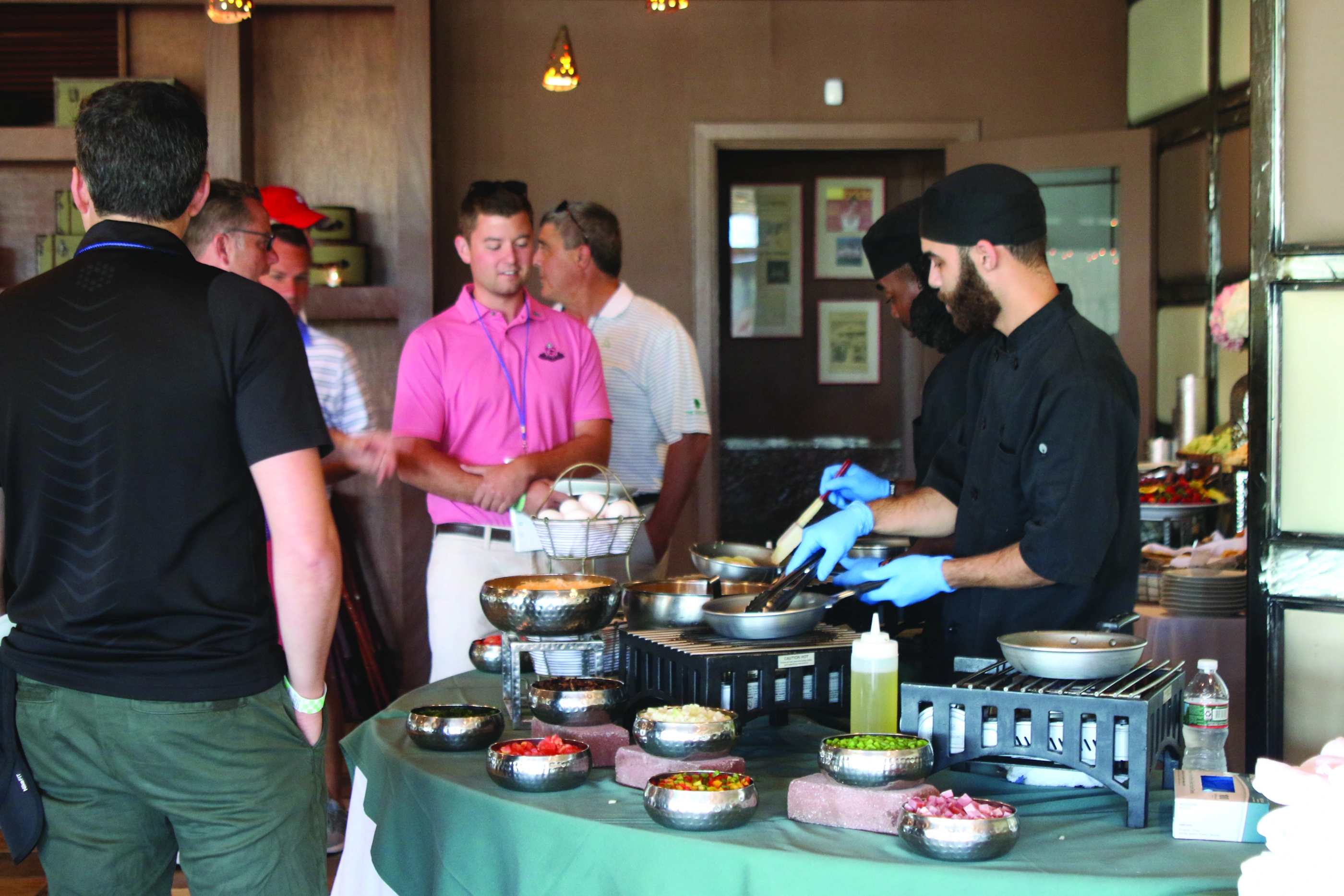 Chef preparing made-to-order omelets at ISM hospitality