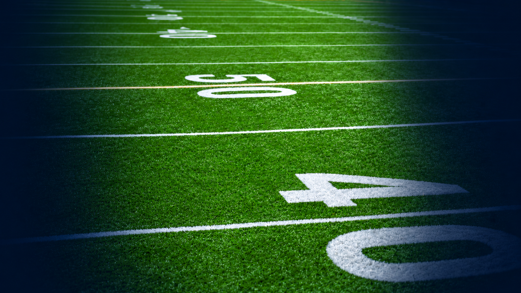 Football field photograph edited with AI to match the approved Super Bowl presentation
