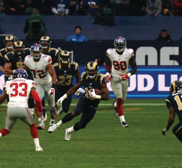 Super Bowl game action from the supplied PDF