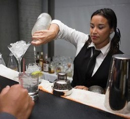 Bartender serving guests from the supplied Super Bowl PDF