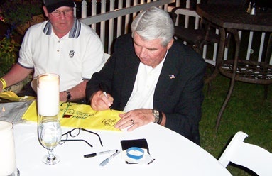 Previous guest speaker Charles Coody signing for guests