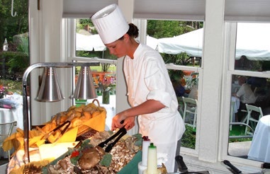 Chef serving guests at ISM hospitality