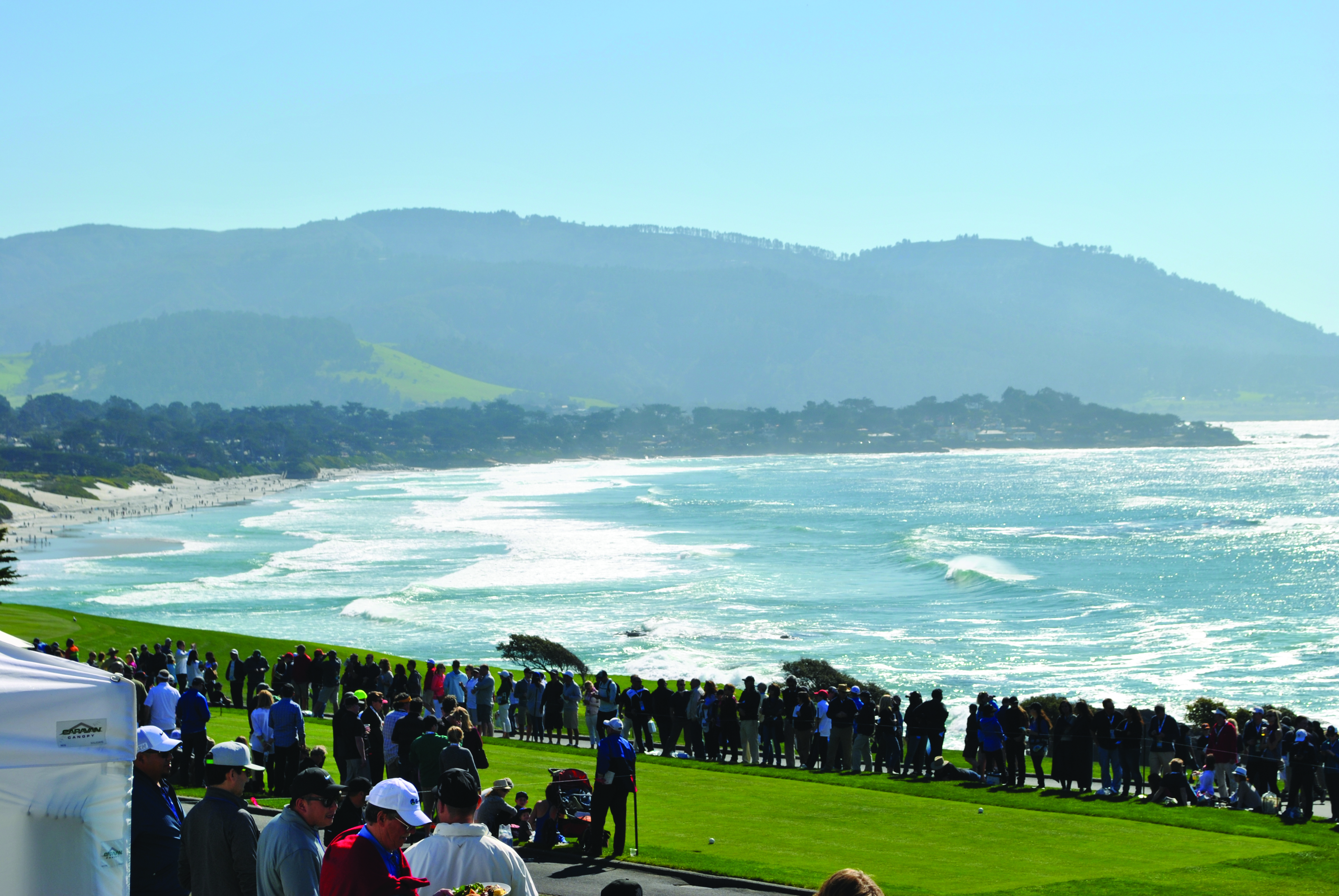 Spectators beside the course and coastline at Pebble Beach, from the supplied ISM brochure