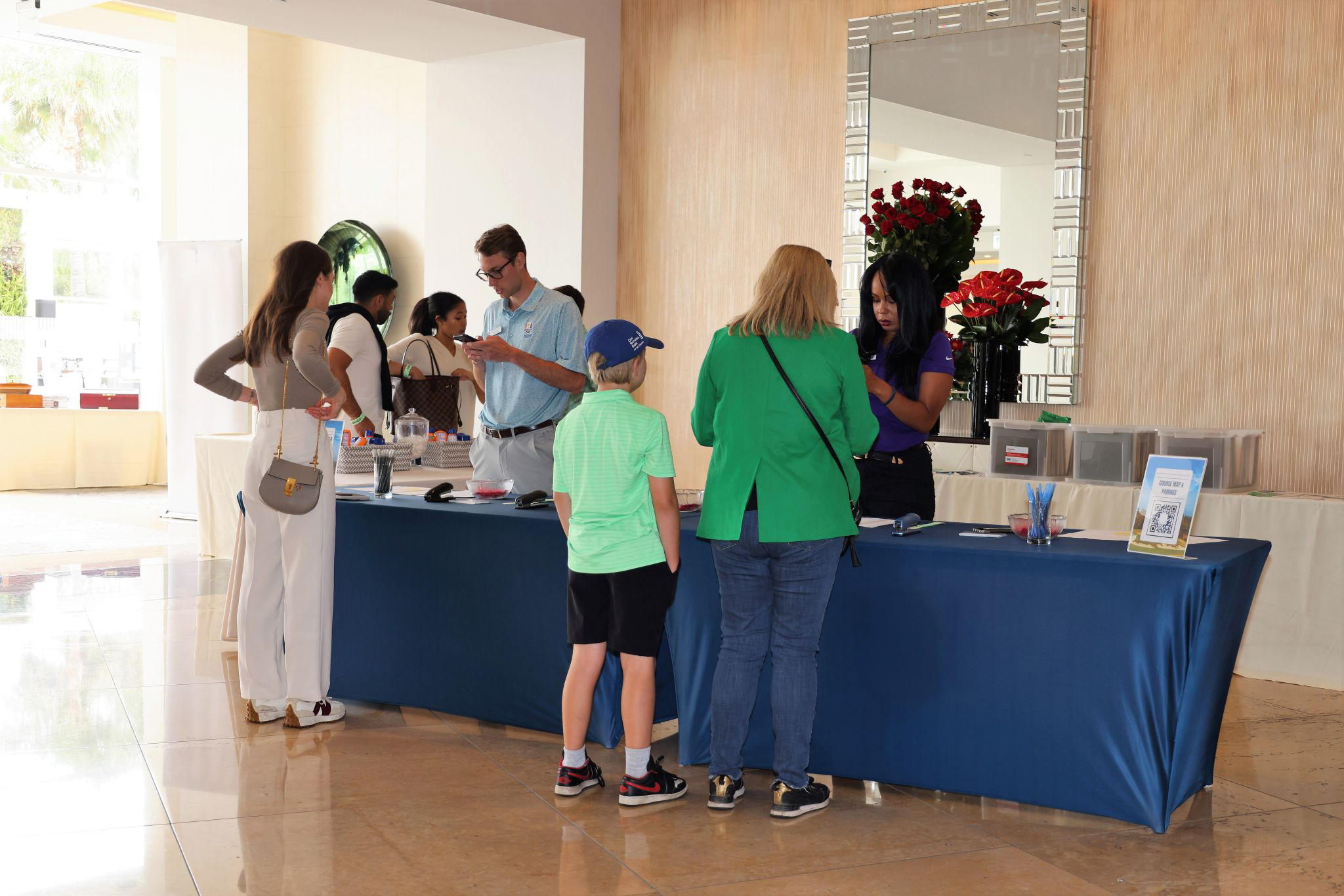 Guests checking in over breakfast before golf