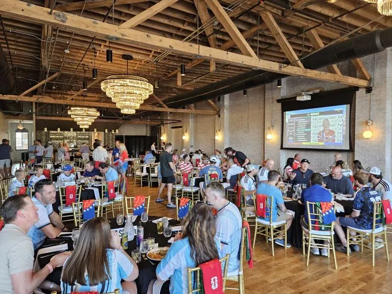 Guests seated in an indoor hospitality venue