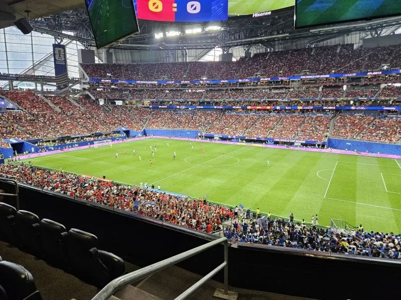 Football stadium illuminated during a match